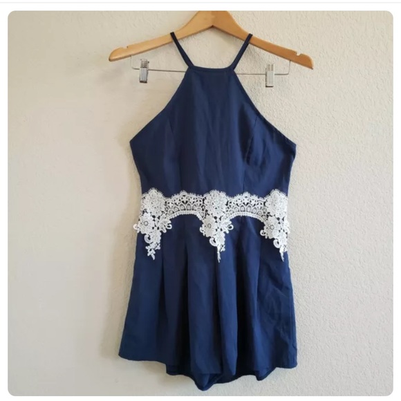 Navy romper with open sides and lace midriff - Picture 1 of 6